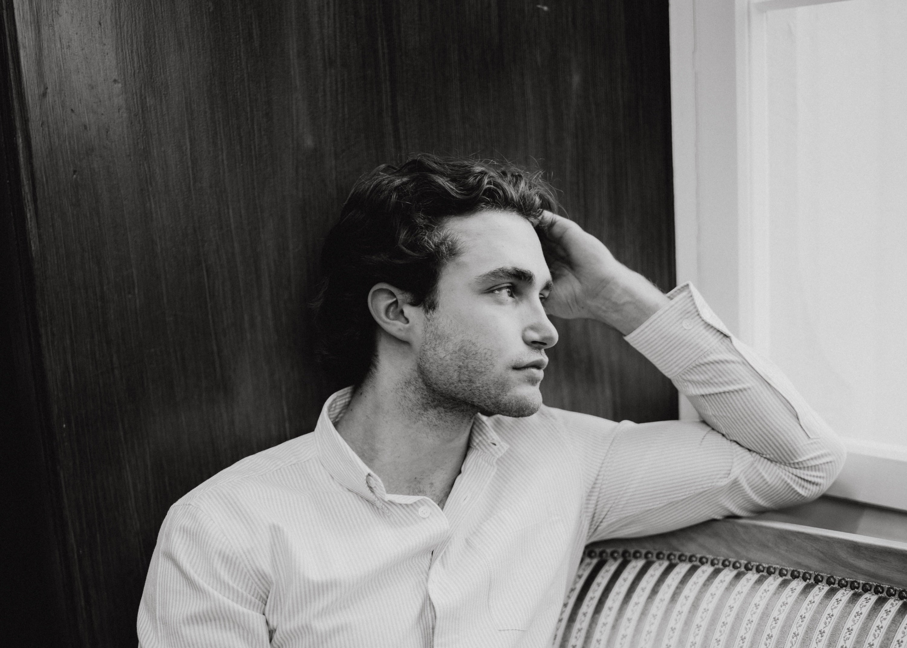 Man in Oxford stripe shirt with pocket